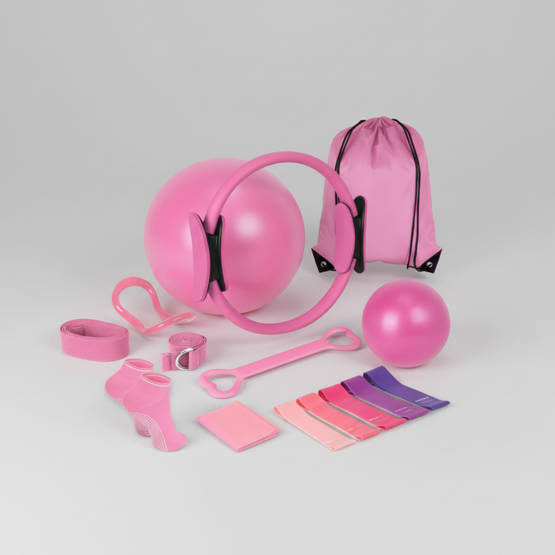 Collection of pink fitness equipment including resistance bands, a ball, and a drawstring bag on a white background.